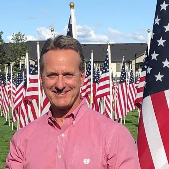 Doug with American flags